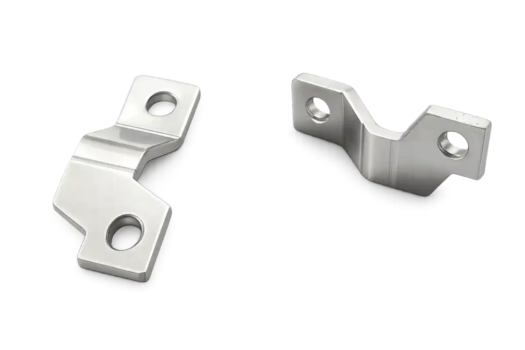 Industrial busbar mounting clamp components.